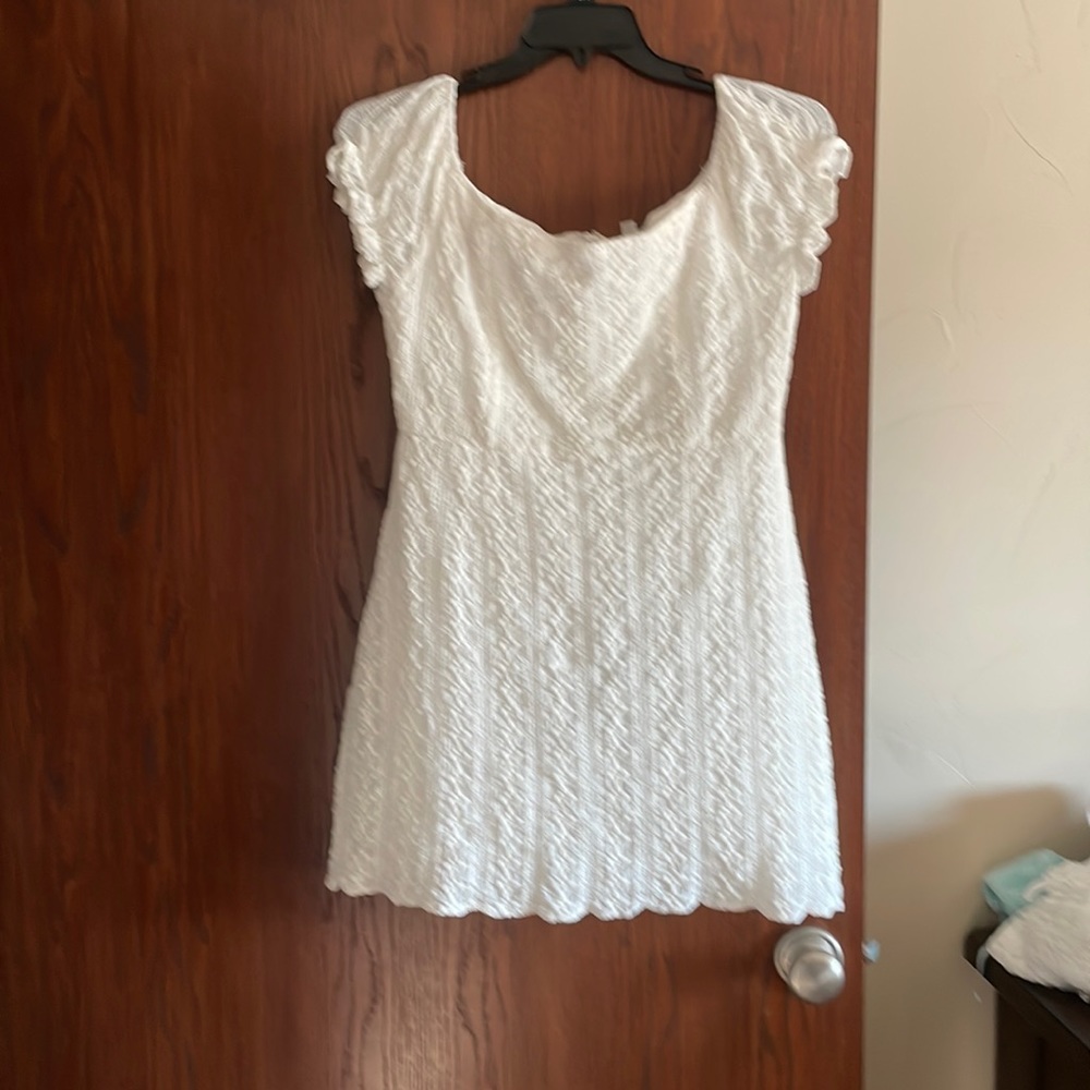 Super cute dress!  Perfect for vacation!  Worn only 1 time.